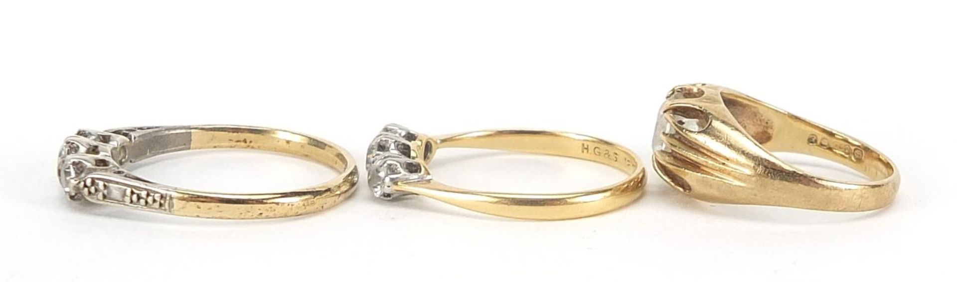 Three 18ct gold and 9ct gold clear stone rings, sizes F, L and O, 6.0g : For Further Condition - Image 2 of 7