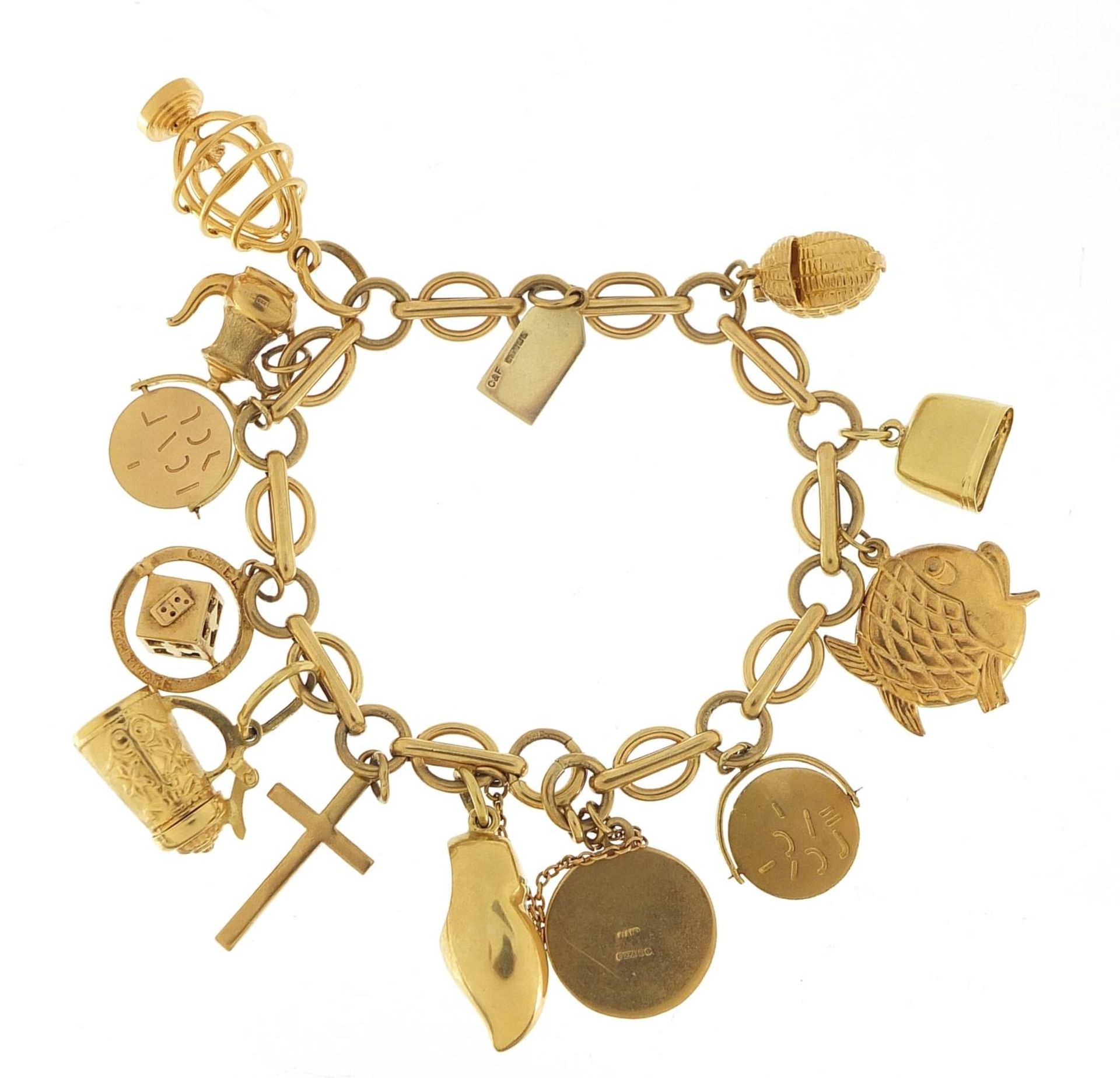 9ct gold charm bracelet with a selection of mostly gold charms including St Christopher, Dutch - Image 4 of 8