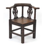 Antique oak corner chair carved with mythical birds, 81cm high : For Further Condition Reports