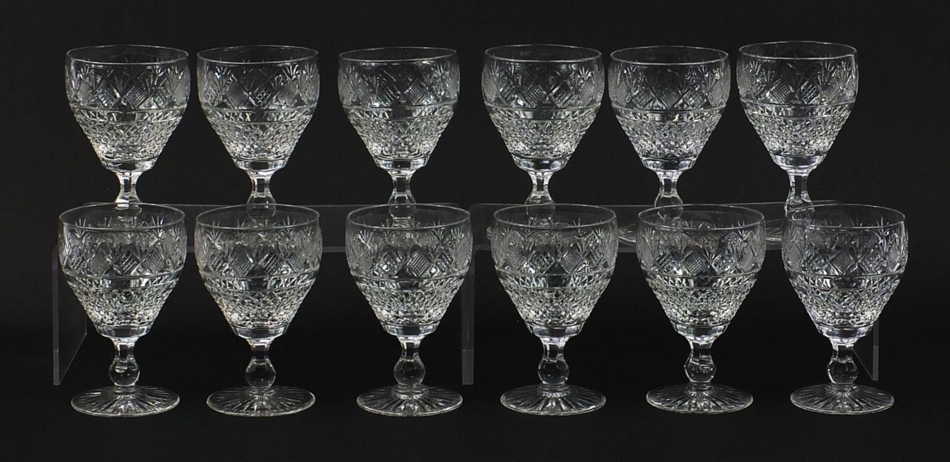 Set of twelve good quality cut crystal glasses, 13.5cm high : For Further Condition Reports Please