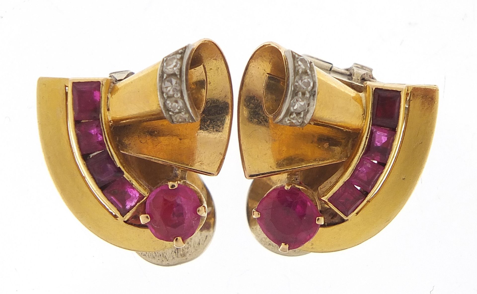 Pair of Art Deco unmarked gold ruby and diamond clip on earrings, (tests as 15ct+ gold) the