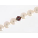 Cultured pearl necklace with 18ct white gold clasp and red glass marcasite spacers, 44cm in length :