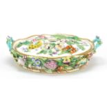 19th century floral encrusted porcelain pot pourri dish and cover with twin handles, possibly