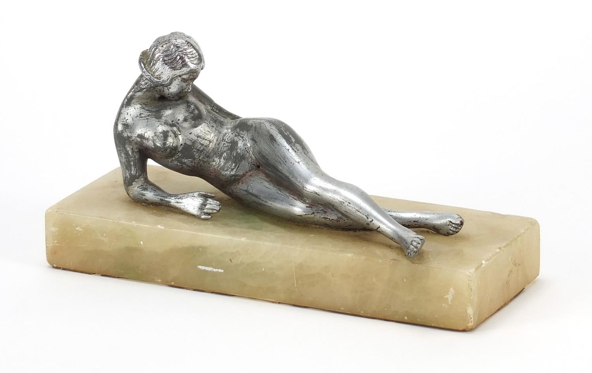 Art Deco design onyx desk weight surmounted with a silvered reclining nude female, 20.5cm wide : For