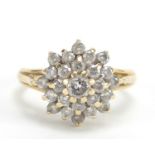 Unmarked gold diamond four tier cluster ring, approximately 1.00 carat in total, size K, 4.2g :