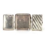 Three Victorian and later silver cigarette cases including an embossed example by William Neale,