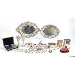 Silverplate including a circular dish mounted with a hare by Epob, planished wine glasses and