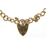 9ct gold charm bracelet with love heart padlock, 16cm in length, 7.2g : For Further Condition