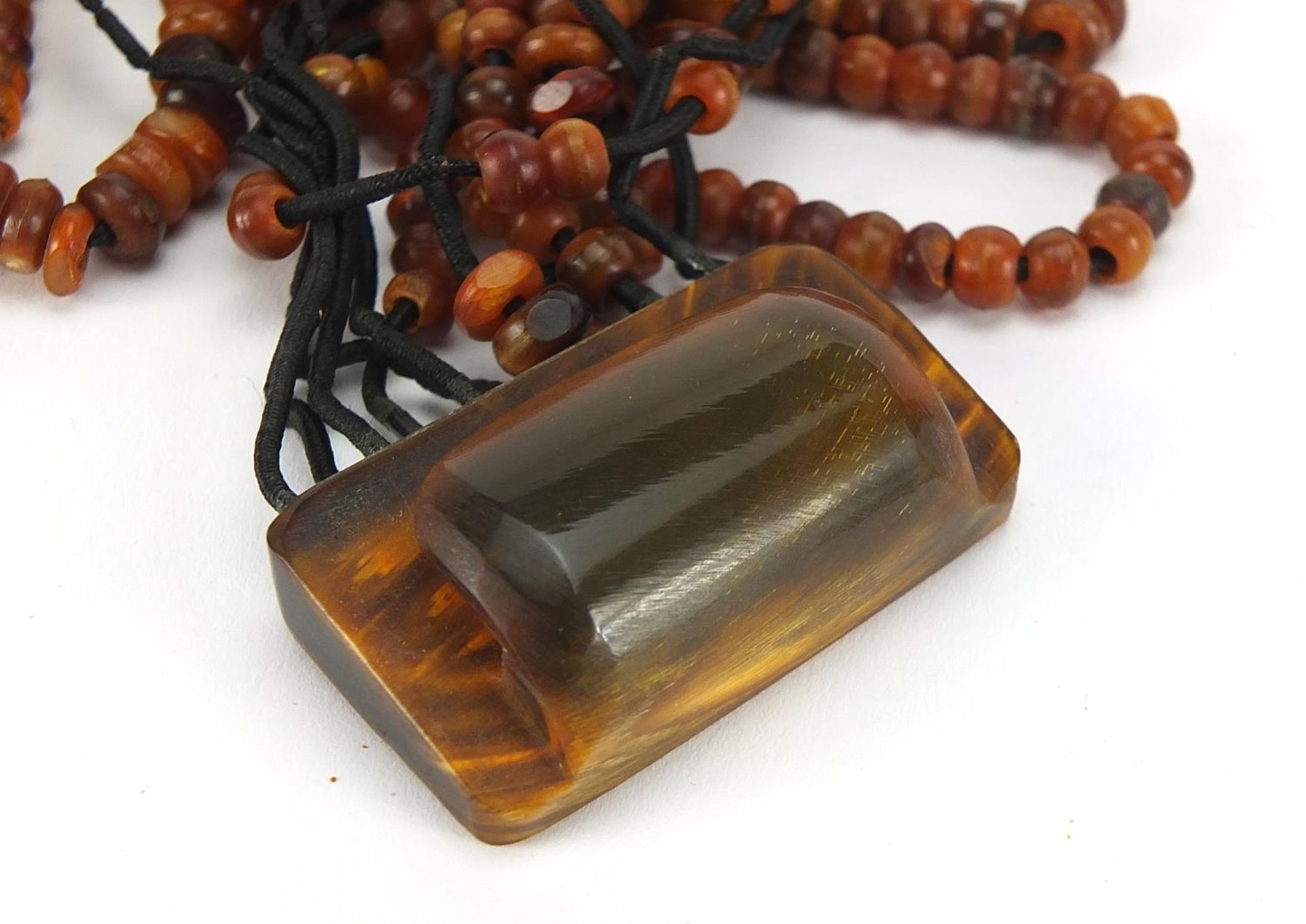Butterscotch amber coloured bead necklace and a twelve row amber coloured necklace, total 244.2g : - Image 4 of 4