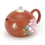 Chinese terracotta teapot enamelled with flowers, character marks to the base, 11cm wide : For