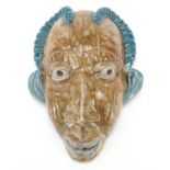 Goldscheider style pottery wall face mask of a tribesman inscribed Mafoud Bemond to the reverse,