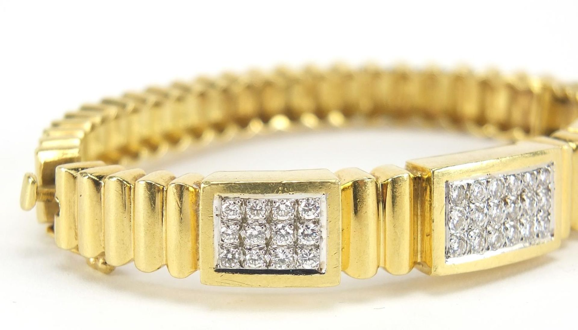 18ct gold diamond cluster hinged bangle, set with forty two diamonds the diamonds approximately 2. - Image 6 of 7