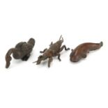 Three Japanese patinated bronze okimonos including a duck, two with character marks, the largest 7cm