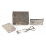 Silver items comprising Georgian sugar nips, cigarette case, compact and calling card case,