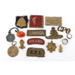 Militaria including Royal Army Service Corps cap badge, GPO cap badge, Wilhelm I medallion and cloth