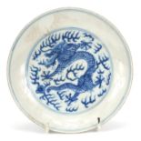 Chinese blue and white porcelain dish hand painted with dragons, six figure character marks to the