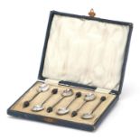 S W Smith & Co, set of six George V silver coffee bean spoons, housed in a velvet and silk lined