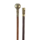 Two mililtary interest swagger sticks including Bedfordshire & Hertfordshire Regiment, 71cm in