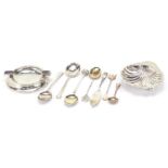 Silver objects including an Edwardian shell shaped bowl, ashtray and teaspoons, the largest 12.5cm