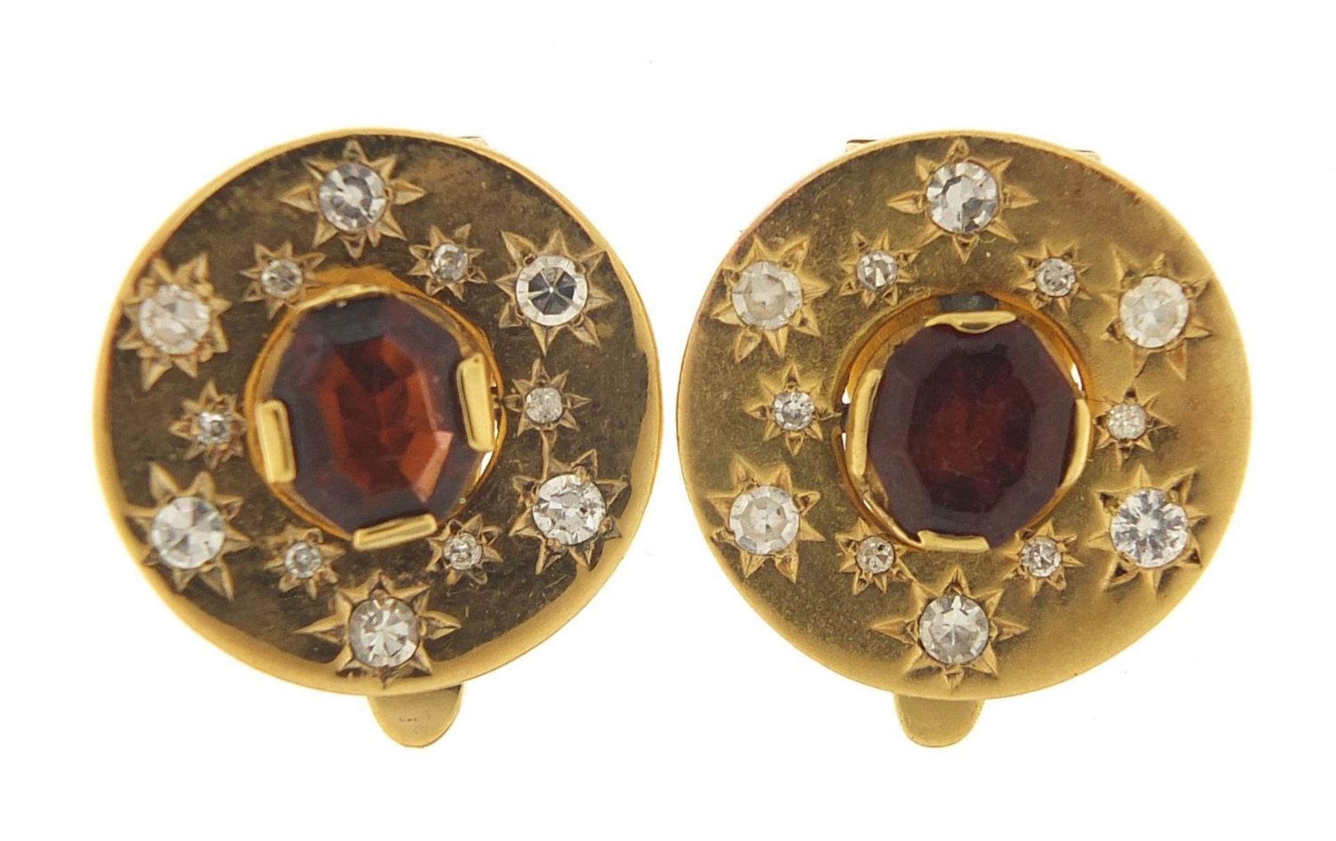 Pair of continental unmarked gold diamond and garnet clip on earrings, (tests as 15ct+ gold) 1.8cm