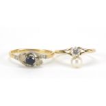 18ct gold sapphire and clear stone crossover ring and a 9ct gold clear stone and simulated pearl