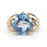 9ct gold blue topaz ring with white sapphire shoulders, size N, 6.3g : For Further Condition Reports