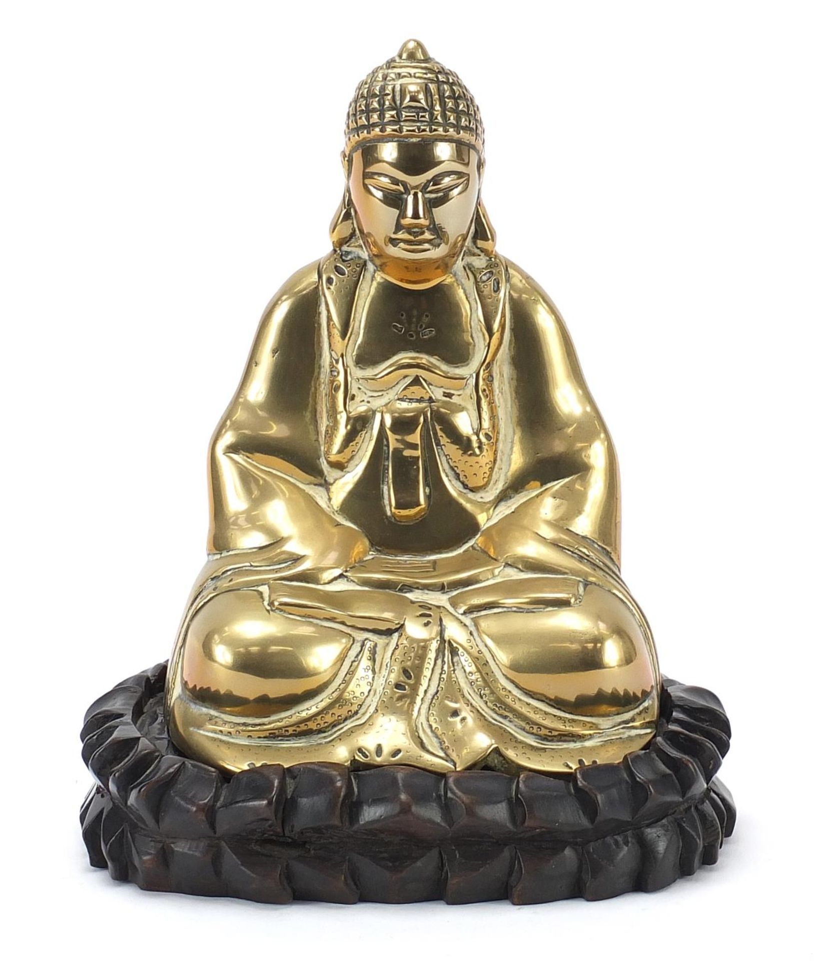 Chinese bronzed figure of Buddha raised on a carved hardwood lotus stand, 23.5cm high : For