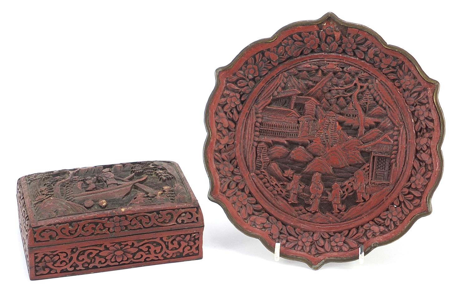 Chinese cinnabar lacquer plate and box with cover, each carved with figures, the largest 21cm in