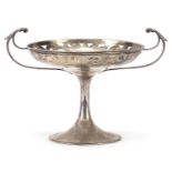 Chinese silver tazza with twin handles, pierced and engraved with foliage, impressed Yok Sang to the