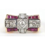 Art Deco unmarked gold diamond and ruby ring of bow design, (tests as 15ct+ gold) the central