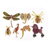 Seven jewelled and enamel animal and insect brooches including poodle, gecko, dragonfly and stork,