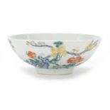 Chinese porcelain bowl hand painted in the famille rose palette with flowers, six figure character