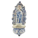 18th century Delft blue and white holy water stoup hand painted with St Anthony of Padua holding