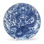 Chinese blue and white porcelain dish hand painted with a dragon, four figure character marks and