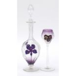 Early 20th century cameo glass decanter etched with flowers and a similar glass, possibly by