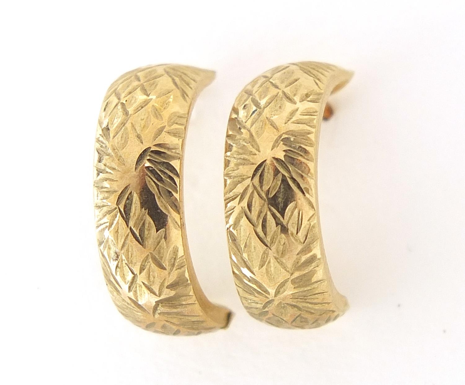 Pair of 9ct gold half hoop earrings with engraved decoration, 1.4cm high, 0.6g : For Further