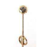 Unmarked gold diamond solitaire stick pin, the diamond approximately 3.5mm in diameter, 6cm in