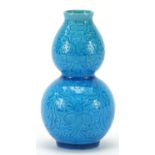 Chinese porcelain double gourd vase having a turquoise glaze, character marks to the base, 13cm high