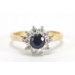 18ct gold sapphire and diamond ring, the sapphire approximately 4.8mm in diameter, size N, 3.8g :