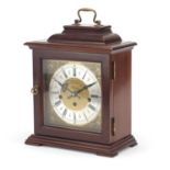 German mahogany cased Westminster chiming mantle clock with silvered chapter ring having Roman and