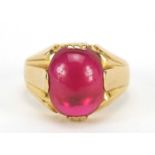 18ct gold cabochon ruby ring, the stone 14mm x 10.5mm x 5.8mm deep, size T, 13.0g : For Further
