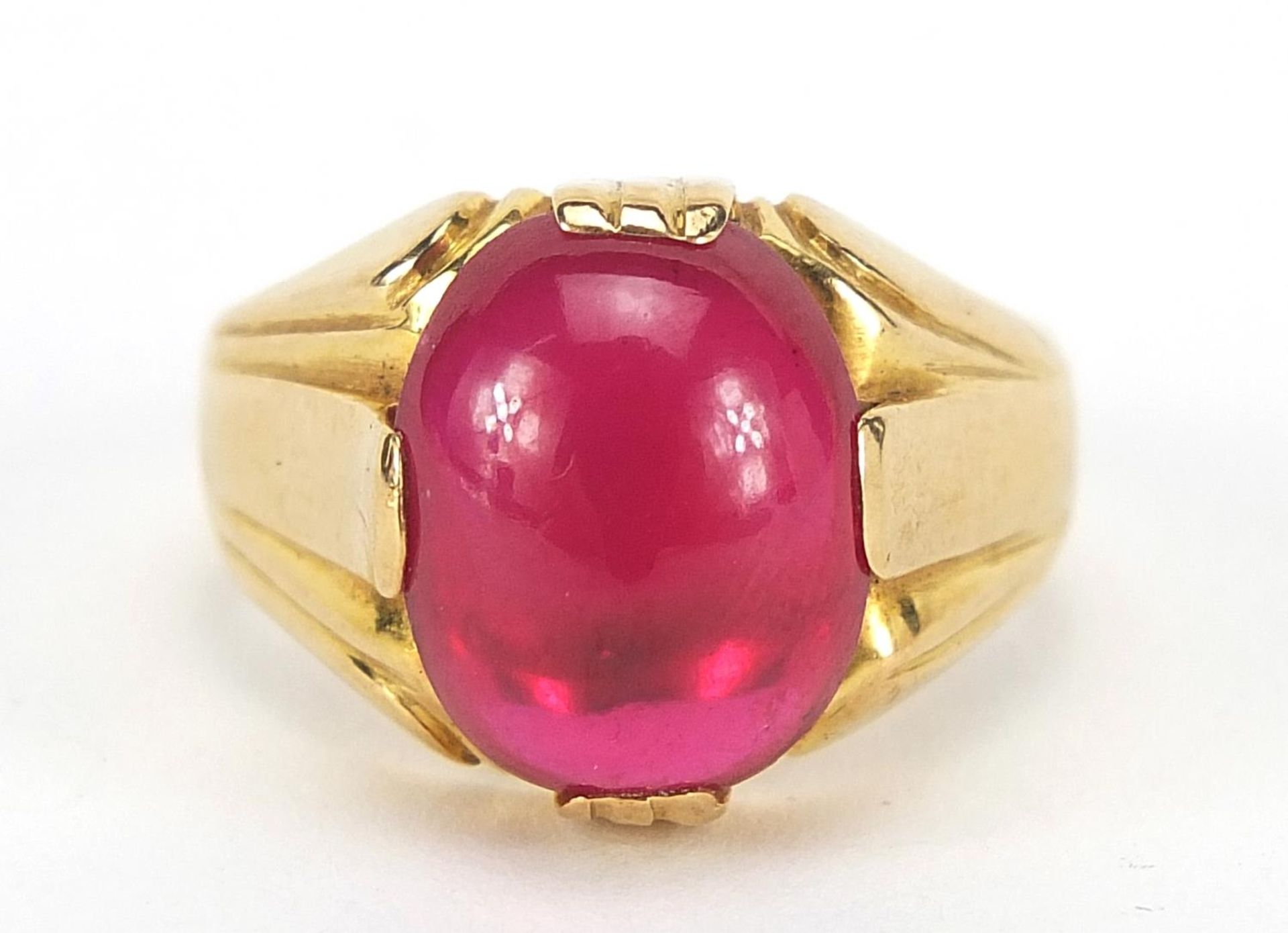 18ct gold cabochon ruby ring, the stone 14mm x 10.5mm x 5.8mm deep, size T, 13.0g : For Further