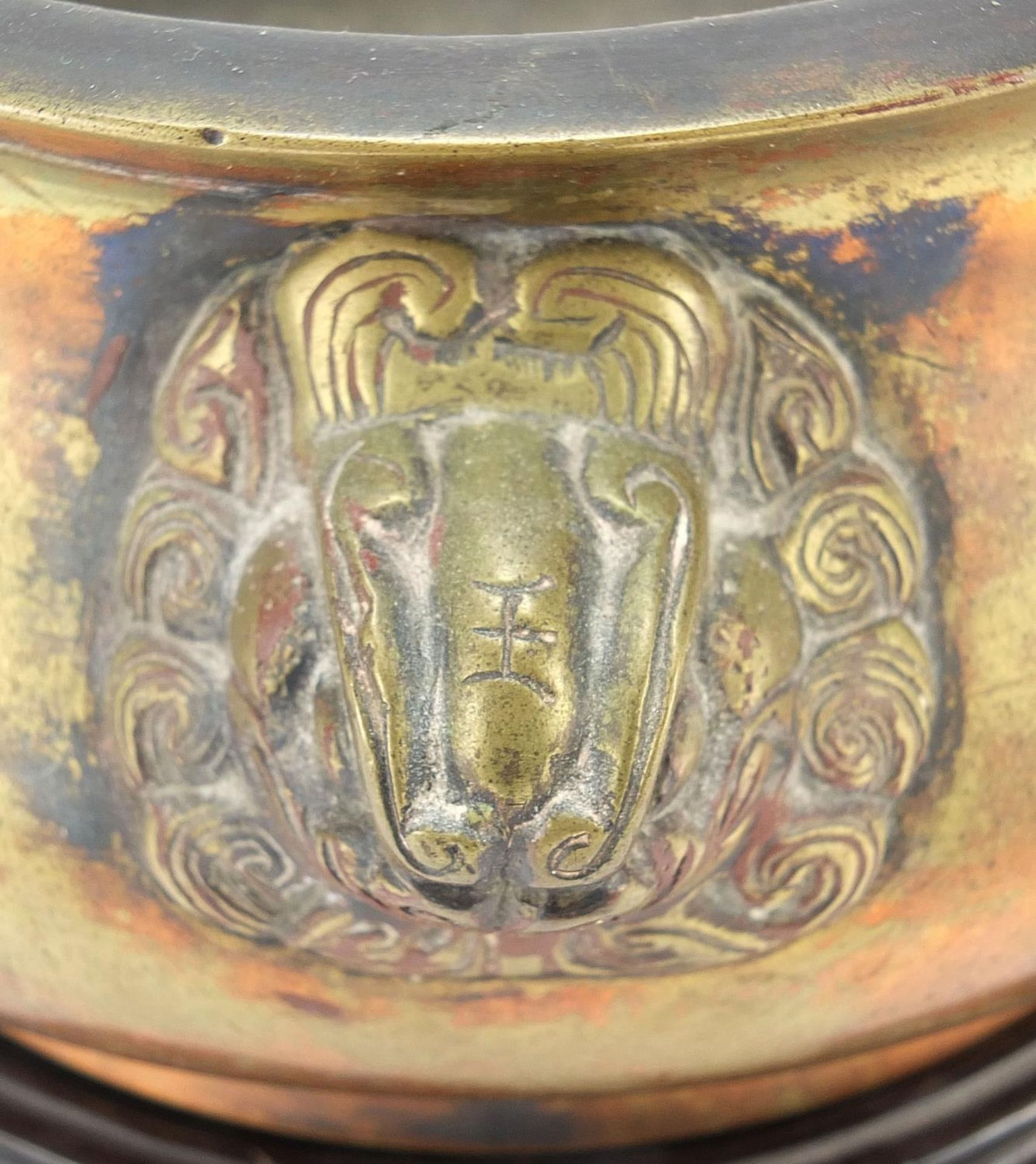 Large Chinese patinated bronze censer with animalia handles raised on a carved hardwood stand, six - Image 8 of 11