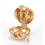 9ct gold apple charm opening to reveal Adam and Eve, 1.2cm high, 4.3g : For Further Condition