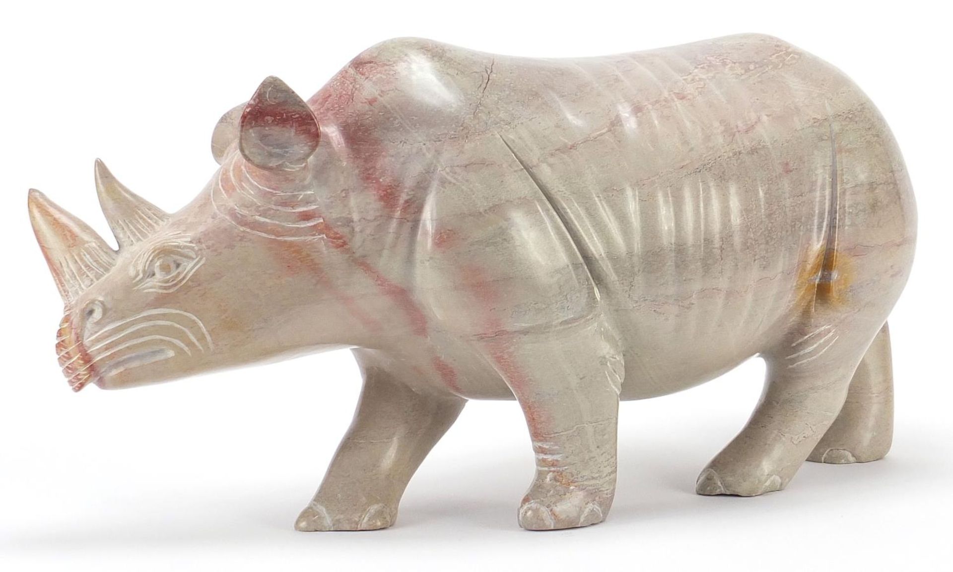 Large marble carving of a rhinoceros, 52cm in length : For Further Condition Reports Please Visit