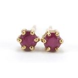 Pair of 9ct gold ruby stud earrings, 3mm in diameter, 0.6g : For Further Condition Reports Please