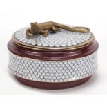 Continental porcelain box and cover surmounted with a bronze lizard, 13.5cm in diameter : For