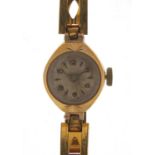 Ladies 9ct gold wristwatch with gold coloured metal strap, 14mm in diameter : For Further