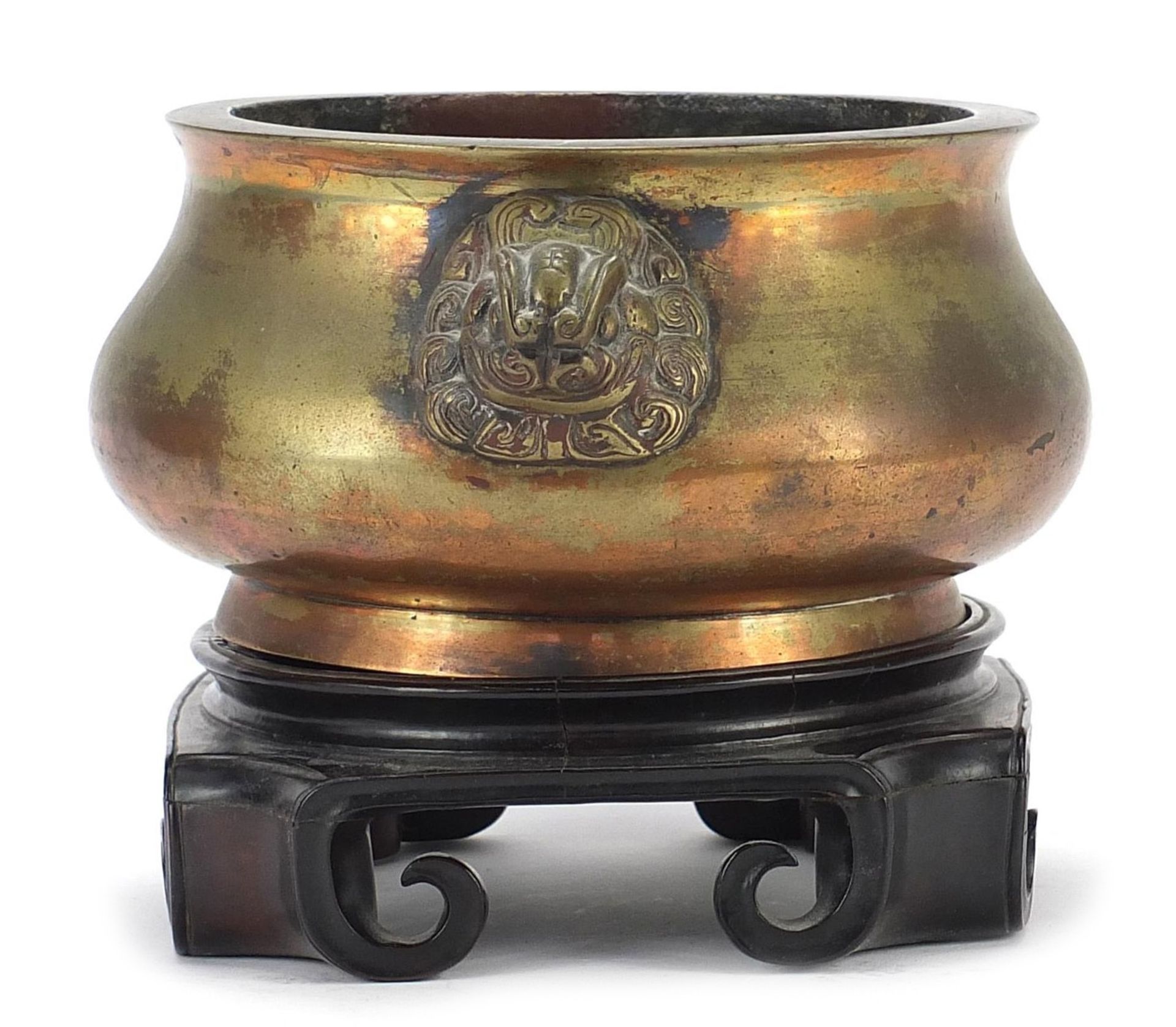 Large Chinese patinated bronze censer with animalia handles raised on a carved hardwood stand, six - Image 7 of 11