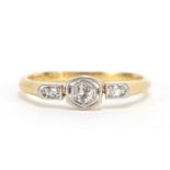 Art Deco 18ct gold diamond three stone ring, the central diamond approximately 2mm in diameter, size